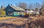 DL 2045 westbound past the Cresco passenger depot